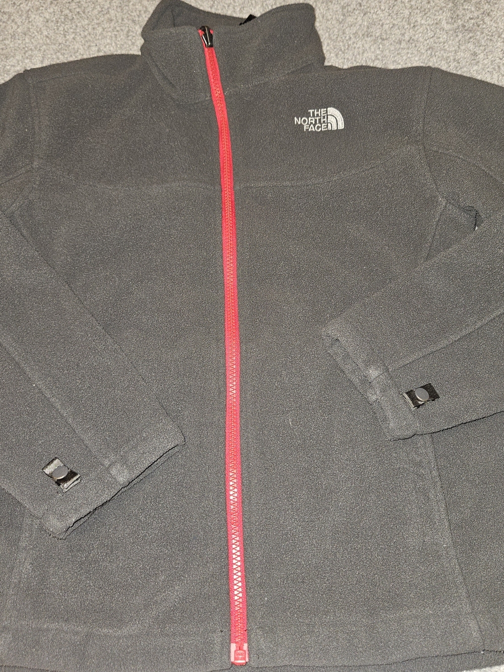 The North Face Kids Dark Gray Fleece Jacket.